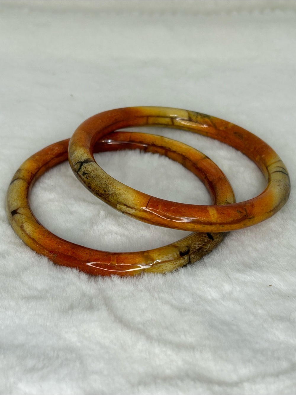SET OF TWO APPLE SPONGE CORAL BANGLE BRACELETS